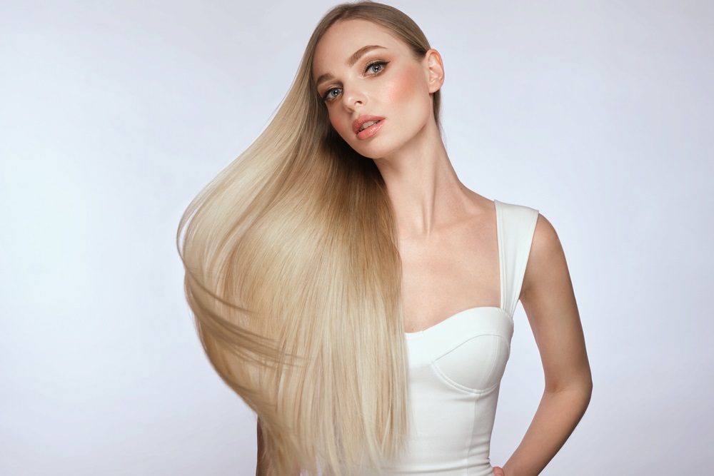 Woman with thin hair showing the best type of hair extensions