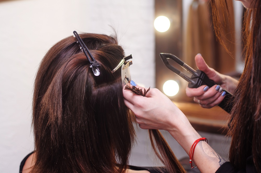 Woman with thin hair showing the best type of hair extensions