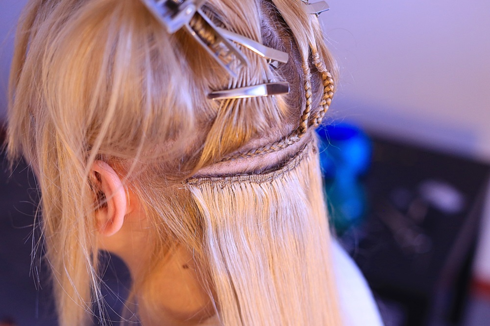 Woman with thin hair showing the best type of hair extensions